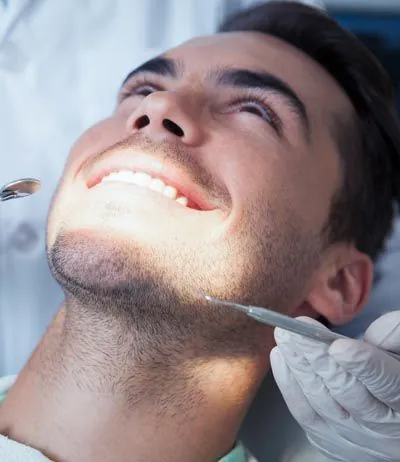 man getting dental care at Laurel Bush Family Dentistry